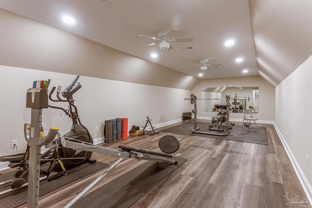 exercise area featuring vaulted ceiling, ceiling fan, and hardwood / wood-style floors