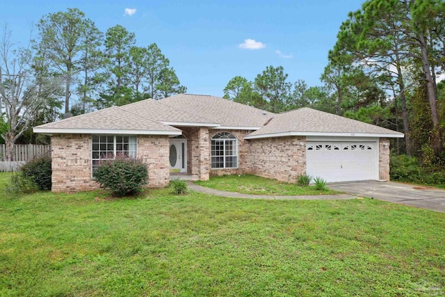 ranch-style house with a front yard and a garage