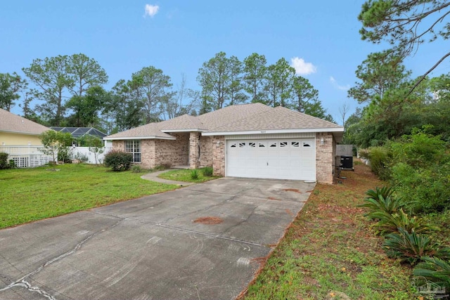 ranch-style house with a front yard, a garage, and cooling unit