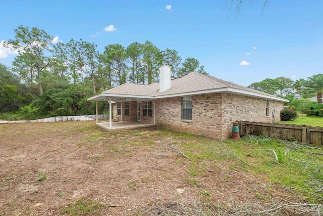 back of house featuring a patio