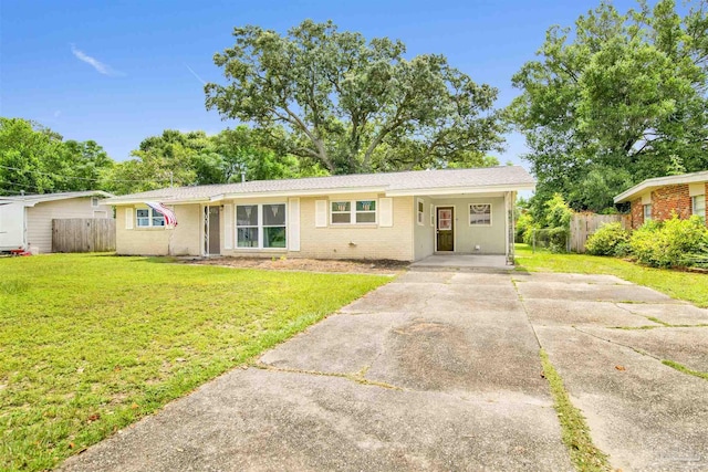 6790 Data St, Pensacola, FL 32504 - ranch-style home with concrete driveway, brick siding, and a carport