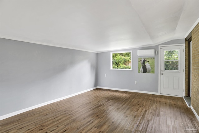 6790 Data St, Pensacola, FL 32504 - empty room with dark wood-style flooring and a wall mounted AC
