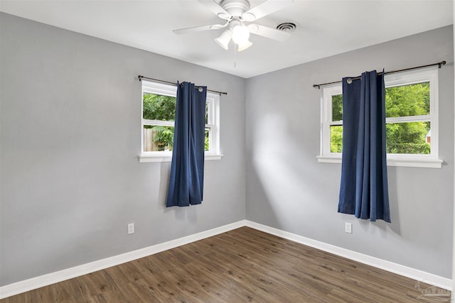 6790 Data St, Pensacola, FL 32504 - spare room featuring wood finished floors and a ceiling fan