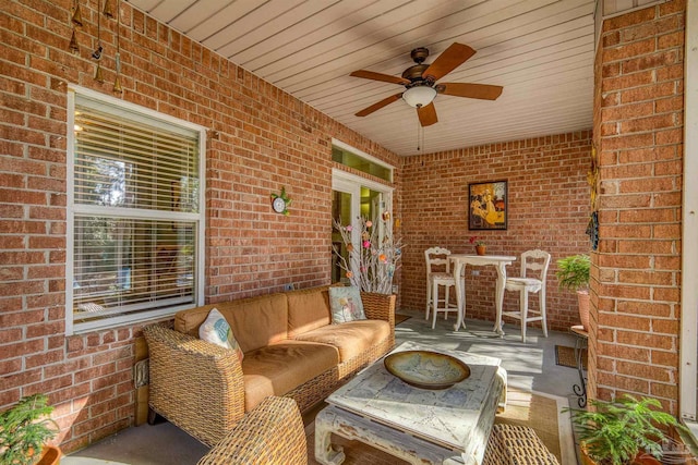 view of patio with outdoor lounge area and ceiling fan