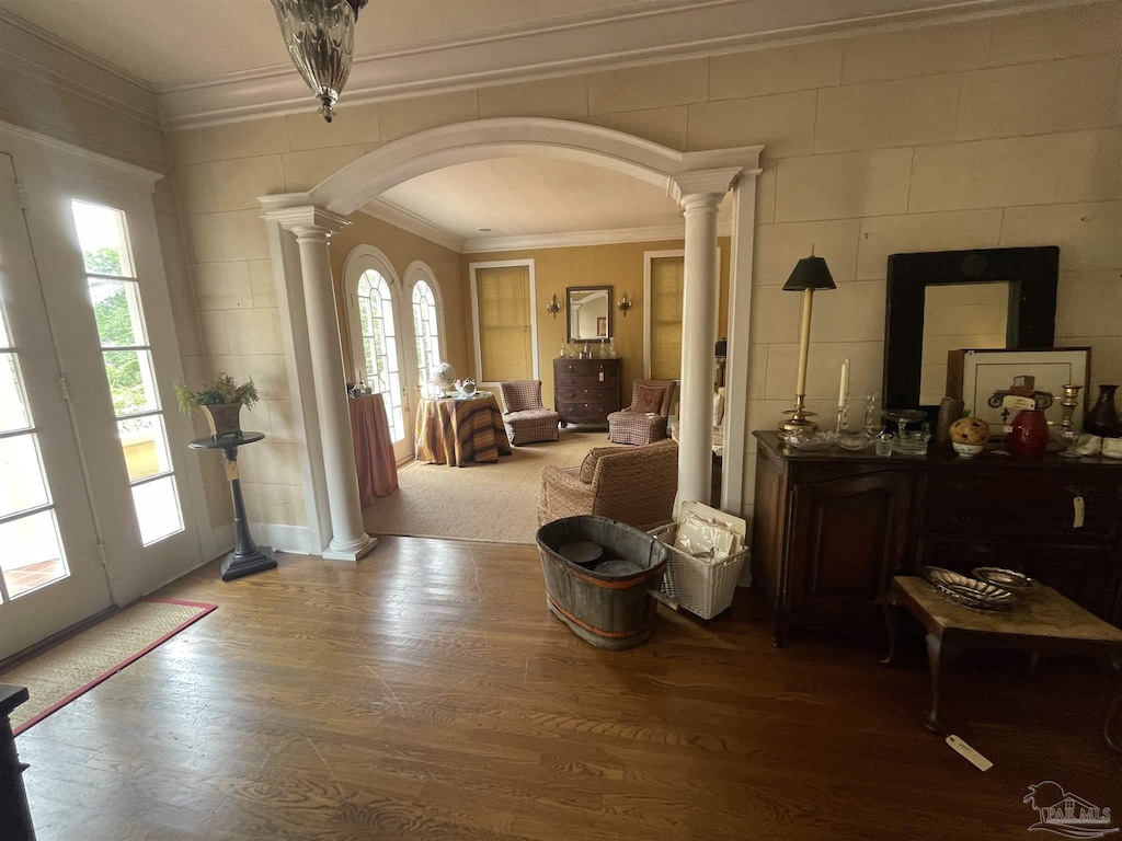 1904 E Larua St, Pensacola, FL 32501 - entryway with ornate columns, ornamental molding, arched walkways, and wood finished floors