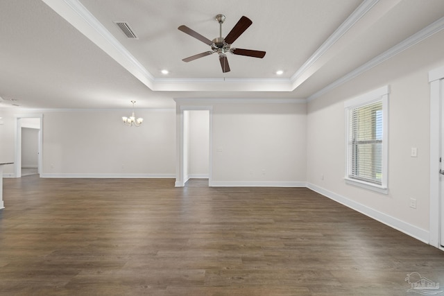 unfurnished living room featuring crown molding, a tray ceiling, ceiling fan with notable chandelier, and dark hardwood / wood-style flooring