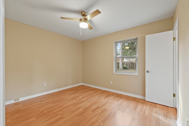 spare room featuring ceiling fan and light hardwood / wood-style floors