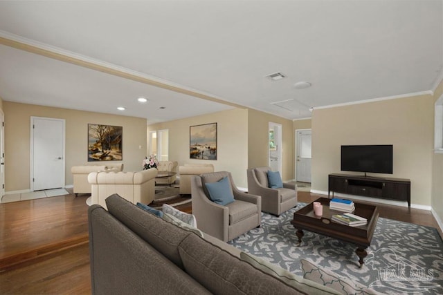 living room with ornamental molding and dark wood-type flooring