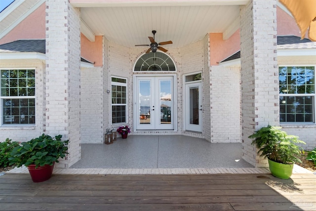 5136 Point Shores Ln, Gulf Breeze, FL 32563 - property entrance featuring brick siding, a ceiling fan, and french doors