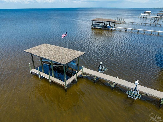 5136 Point Shores Ln, Gulf Breeze, FL 32563 - view of dock with boat lift and a water view