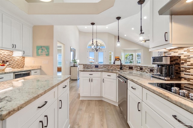 5136 Point Shores Ln, Gulf Breeze, FL 32563 - kitchen with recessed lighting, a sink, light wood finished floors, and black electric cooktop