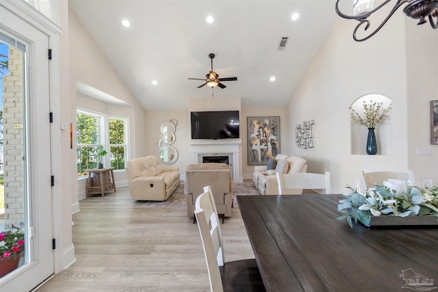 5136 Point Shores Ln, Gulf Breeze, FL 32563 - dining space with a ceiling fan, visible vents, a fireplace, light wood-type flooring, and recessed lighting