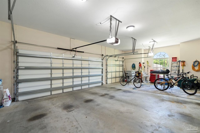 5136 Point Shores Ln, Gulf Breeze, FL 32563 - garage featuring a garage door opener