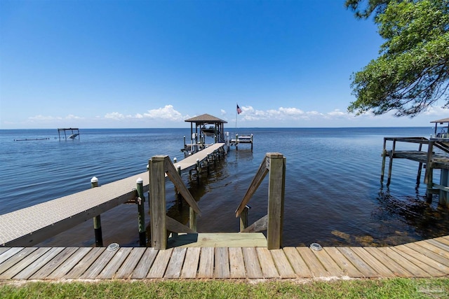 5136 Point Shores Ln, Gulf Breeze, FL 32563 - view of dock featuring a water view and boat lift
