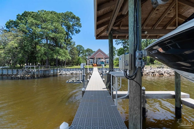 5136 Point Shores Ln, Gulf Breeze, FL 32563 - dock area with boat lift and a water view