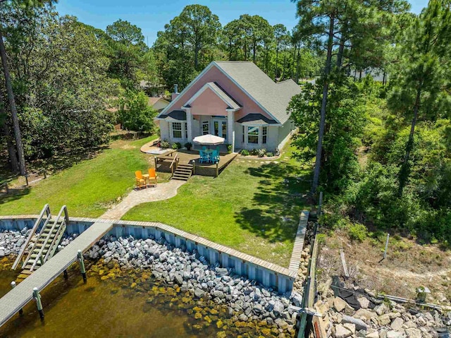 5136 Point Shores Ln, Gulf Breeze, FL 32563 - back of house with a yard and a wooden deck