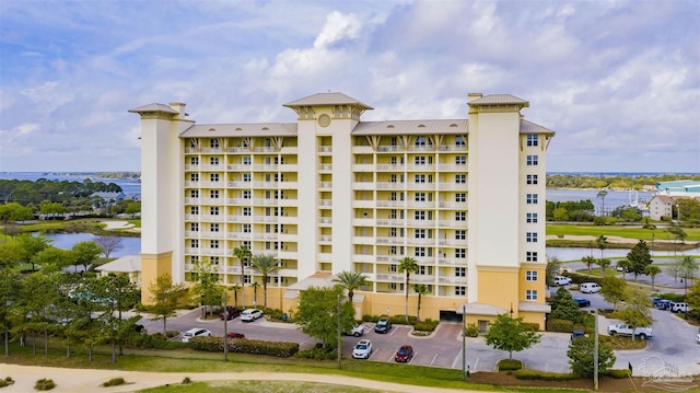 view of building exterior with a water view