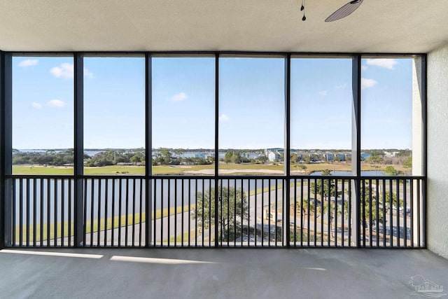 unfurnished sunroom featuring plenty of natural light