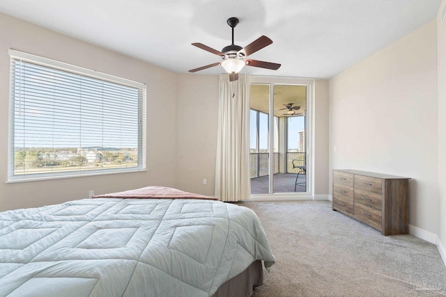 bedroom with a ceiling fan, access to outside, light carpet, and baseboards