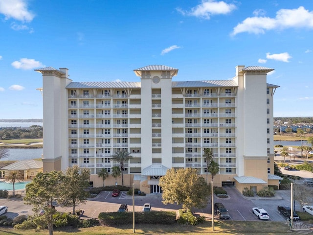 view of building exterior featuring a water view