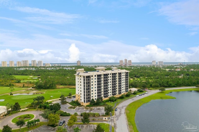 bird's eye view featuring a view of city and a water view