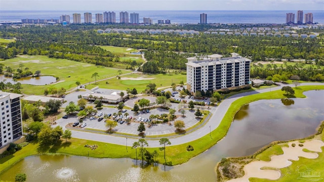 drone / aerial view with a view of city and a water view