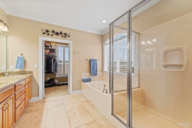 bathroom with vanity, tile patterned flooring, crown molding, and separate shower and tub