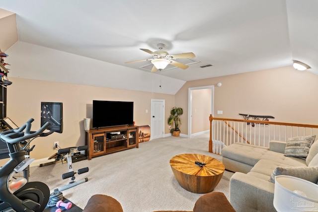 carpeted living room with vaulted ceiling and ceiling fan