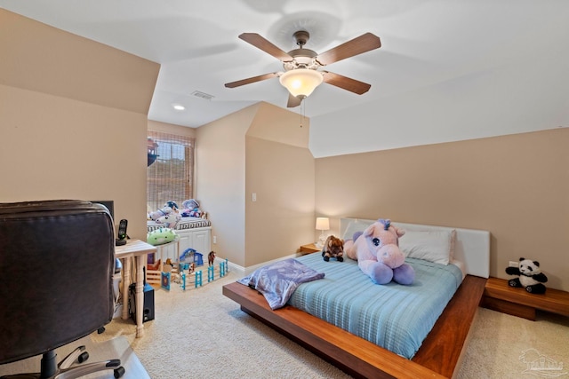 bedroom featuring ceiling fan, carpet flooring, and vaulted ceiling