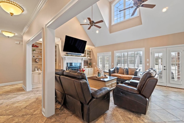 living room with crown molding, ceiling fan, high vaulted ceiling, built in shelves, and french doors