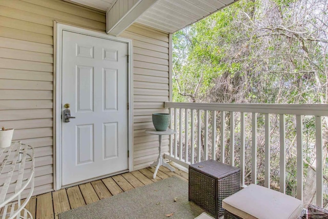 doorway to property with a balcony