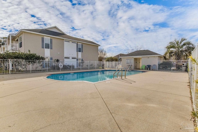 view of swimming pool featuring a patio