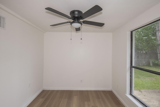 60 Stanford Rd, Pensacola, FL 32506 - empty room featuring baseboards and wood finished floors