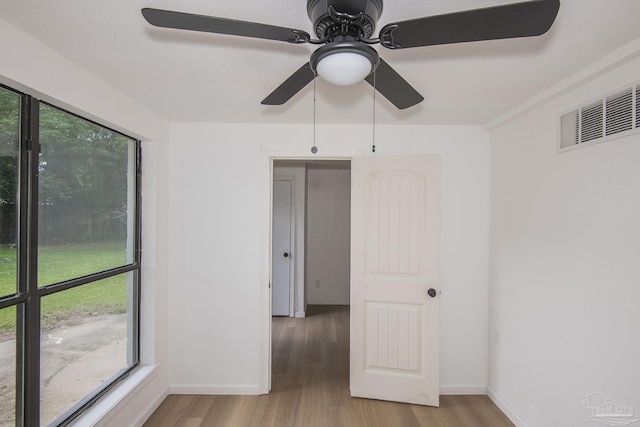 60 Stanford Rd, Pensacola, FL 32506 - spare room featuring light wood-style flooring, visible vents, and baseboards