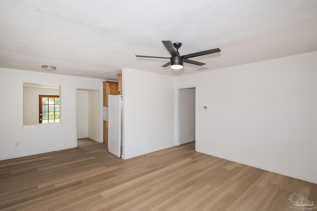 60 Stanford Rd, Pensacola, FL 32506 - unfurnished room with light wood-style floors, visible vents, ceiling fan, and a textured ceiling