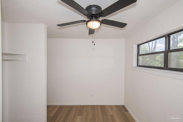 60 Stanford Rd, Pensacola, FL 32506 - unfurnished room with baseboards and wood finished floors