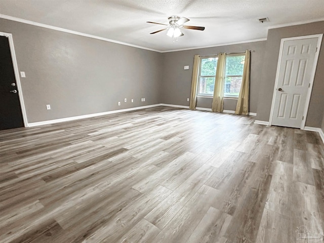 6910 Cornelius Ln, Pensacola, FL 32505 - empty room featuring ceiling fan, crown molding, and wood finished floors