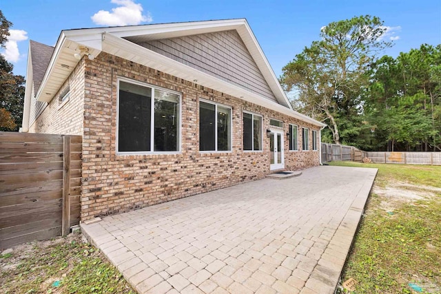 view of home's exterior with a patio