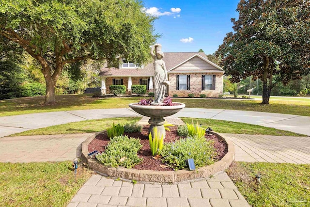 view of front of house with a front lawn