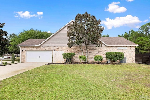 view of front of house featuring a front yard, central AC, and a garage