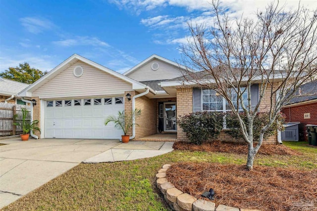 single story home featuring a garage