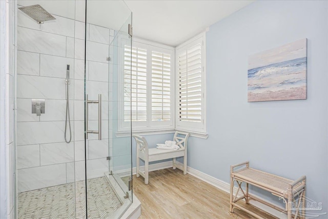 13599 Perdido Key Dr Unit T-2C, Perdido Key, FL 32507 - bathroom with a stall shower and wood finished floors