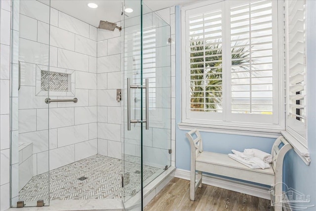 13599 Perdido Key Dr Unit T-2C, Perdido Key, FL 32507 - full bathroom featuring a stall shower and wood finished floors