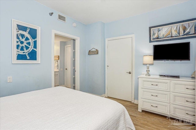 13599 Perdido Key Dr Unit T-2C, Perdido Key, FL 32507 - bedroom featuring light wood-style flooring and baseboards