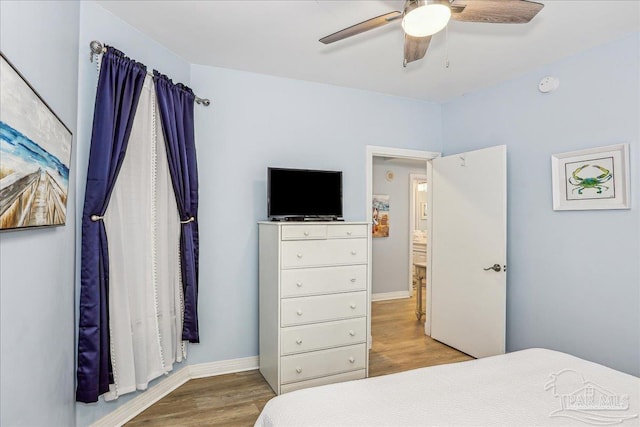 13599 Perdido Key Dr Unit T-2C, Perdido Key, FL 32507 - bedroom with wood finished floors and a ceiling fan