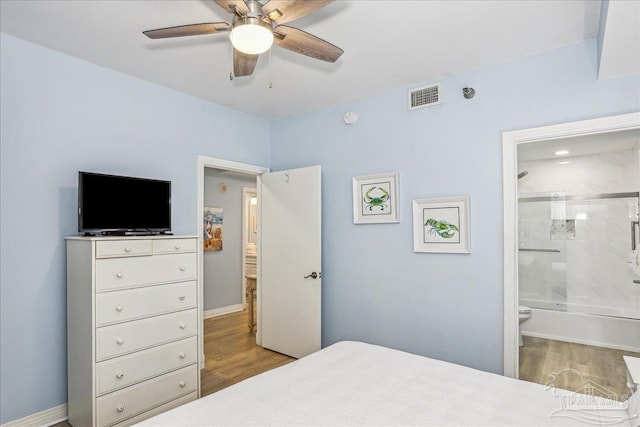 13599 Perdido Key Dr Unit T-2C, Perdido Key, FL 32507 - bedroom with wood finished floors, connected bathroom, and ceiling fan