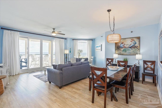 13599 Perdido Key Dr Unit T-2C, Perdido Key, FL 32507 - dining area featuring light wood finished floors and a ceiling fan