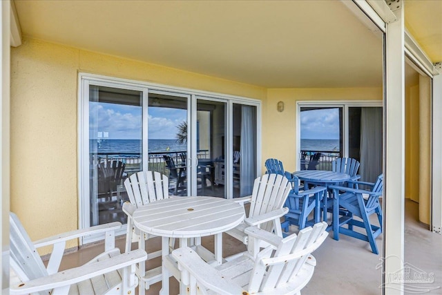 13599 Perdido Key Dr Unit T-2C, Perdido Key, FL 32507 - view of patio / terrace featuring a water view