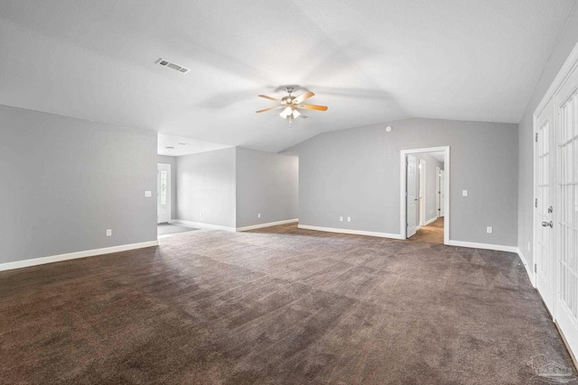 additional living space with ceiling fan, carpet floors, baseboards, lofted ceiling, and visible vents