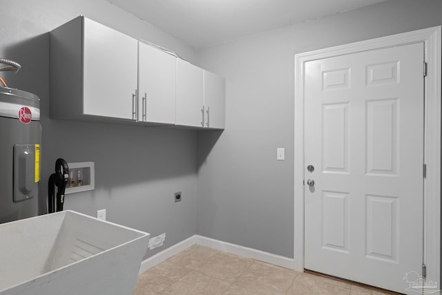 laundry room featuring cabinet space, hookup for a washing machine, water heater, electric dryer hookup, and baseboards